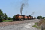 BNSF 5310 starts out after stopping to let a slower train ahead go